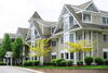 a row of condos on a residential street